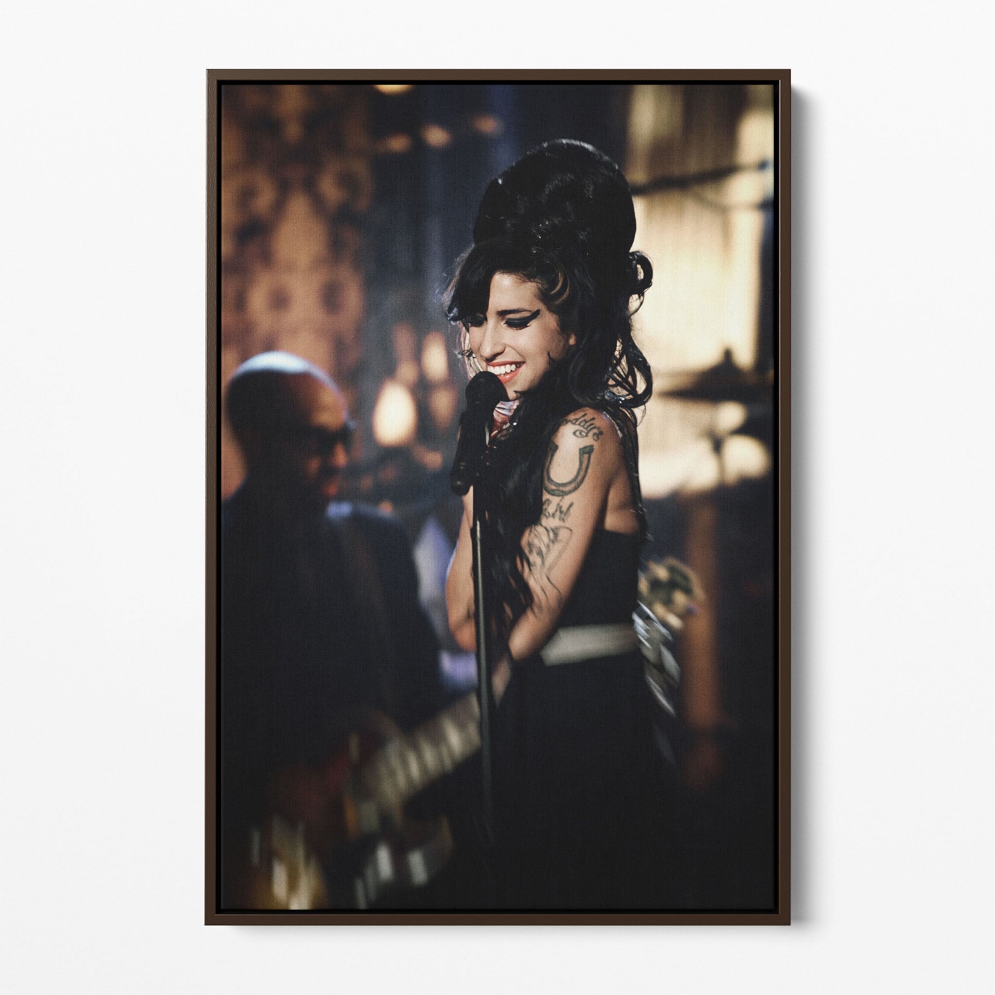 Front display of the Amy Winehouse 2008 Grammys color canvas in a premium dark walnut floating frame.