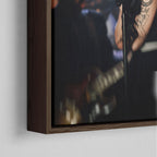 Corner close-up showing the rich grain and joinery of the dark walnut floating canvas frame.