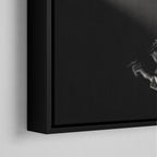 Corner macro of the elegant floating gap and fine finish of the black floating canvas frame.