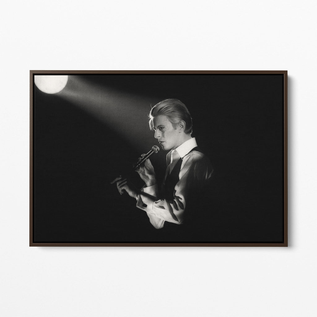 Front display of the David Bowie 1976 black and white canvas in a premium dark walnut floating frame.
