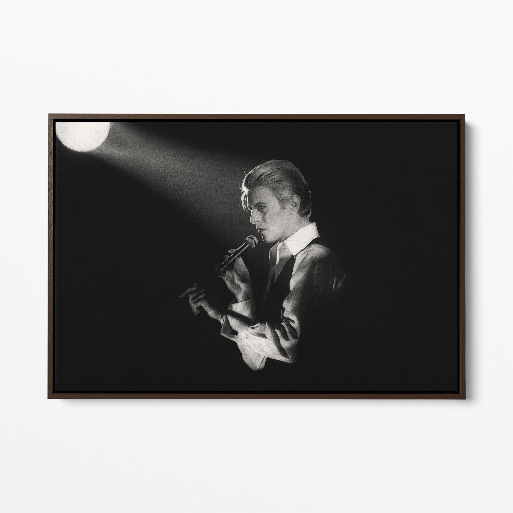 Front display of the David Bowie 1976 black and white canvas in a premium dark walnut floating frame.