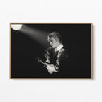 Front display of the David Bowie 1976 black and white canvas in a premium natural wood floating frame.