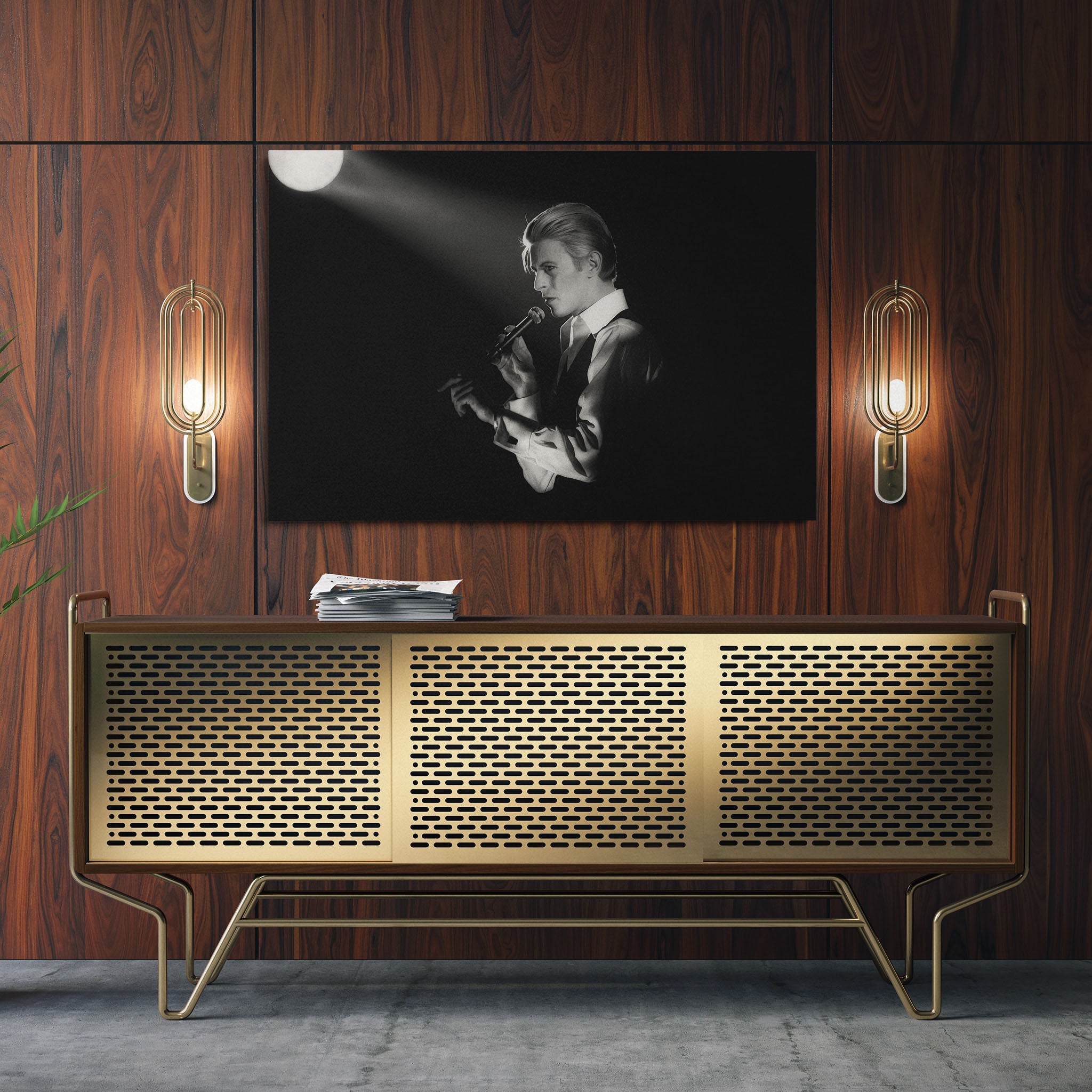 Sleek aluminum black and white metal print of David Bowie displayed over a mid-century modern credenza.