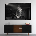 High-gloss acrylic glass black and white print of David Bowie displayed above a contemporary console.