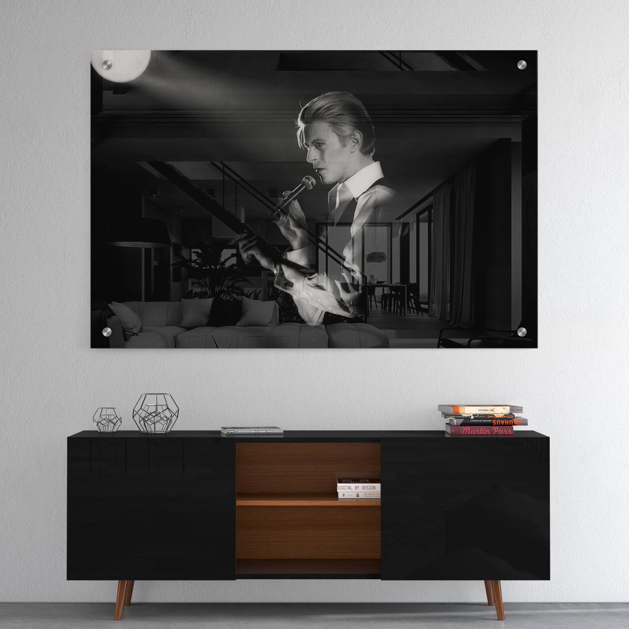 High-gloss acrylic glass black and white print of David Bowie displayed above a contemporary console.
