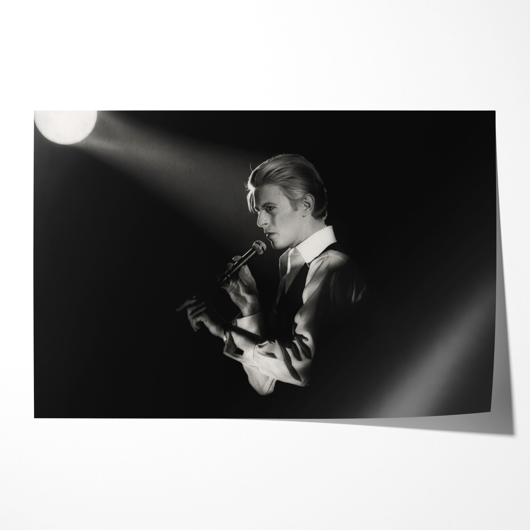 Unframed black and white David Bowie 1976 Isolar Tour profile portrait poster print with dramatic German Expressionist lighting.