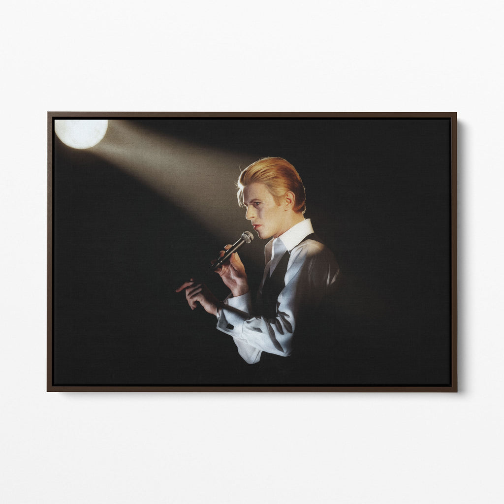Front display of the David Bowie 1976 colorized canvas in a premium dark walnut floating frame.