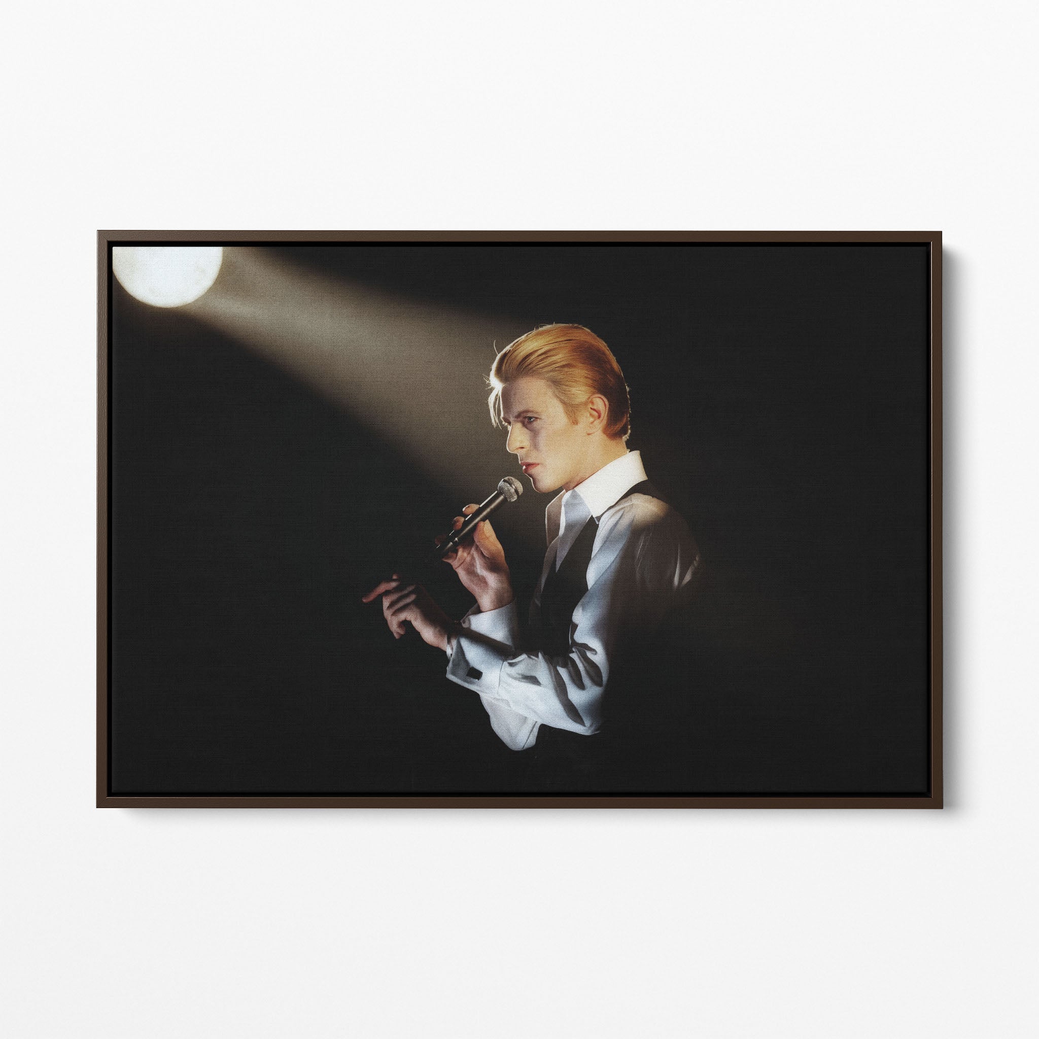 Front display of the David Bowie 1976 colorized canvas in a premium dark walnut floating frame.