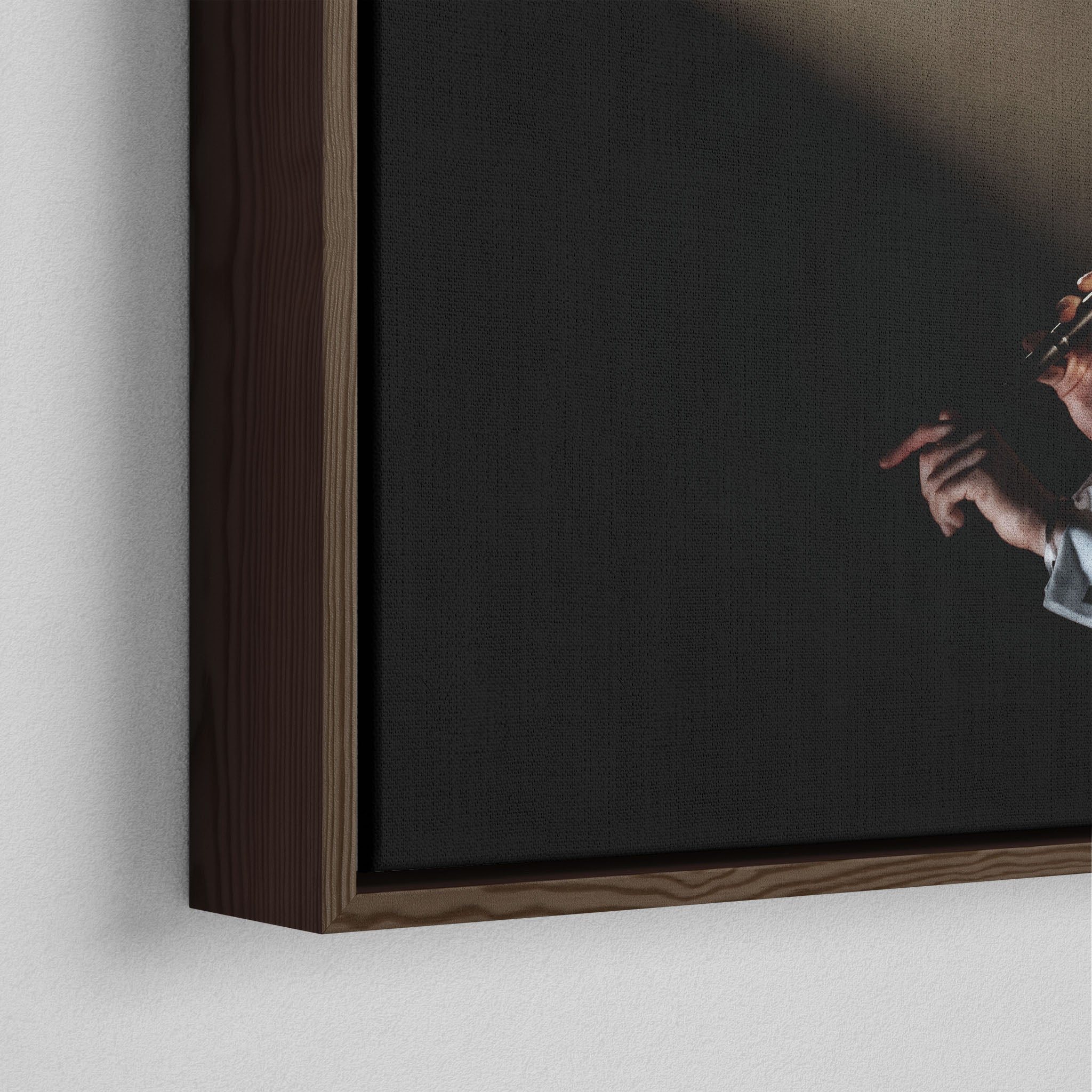 Corner close-up showing the rich grain and joinery of the dark walnut floating canvas frame.