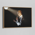 Angled view of the colorized canvas in a modern natural oak wood floating frame.