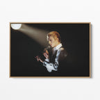 Front display of the David Bowie 1976 colorized canvas in a premium natural wood floating frame.