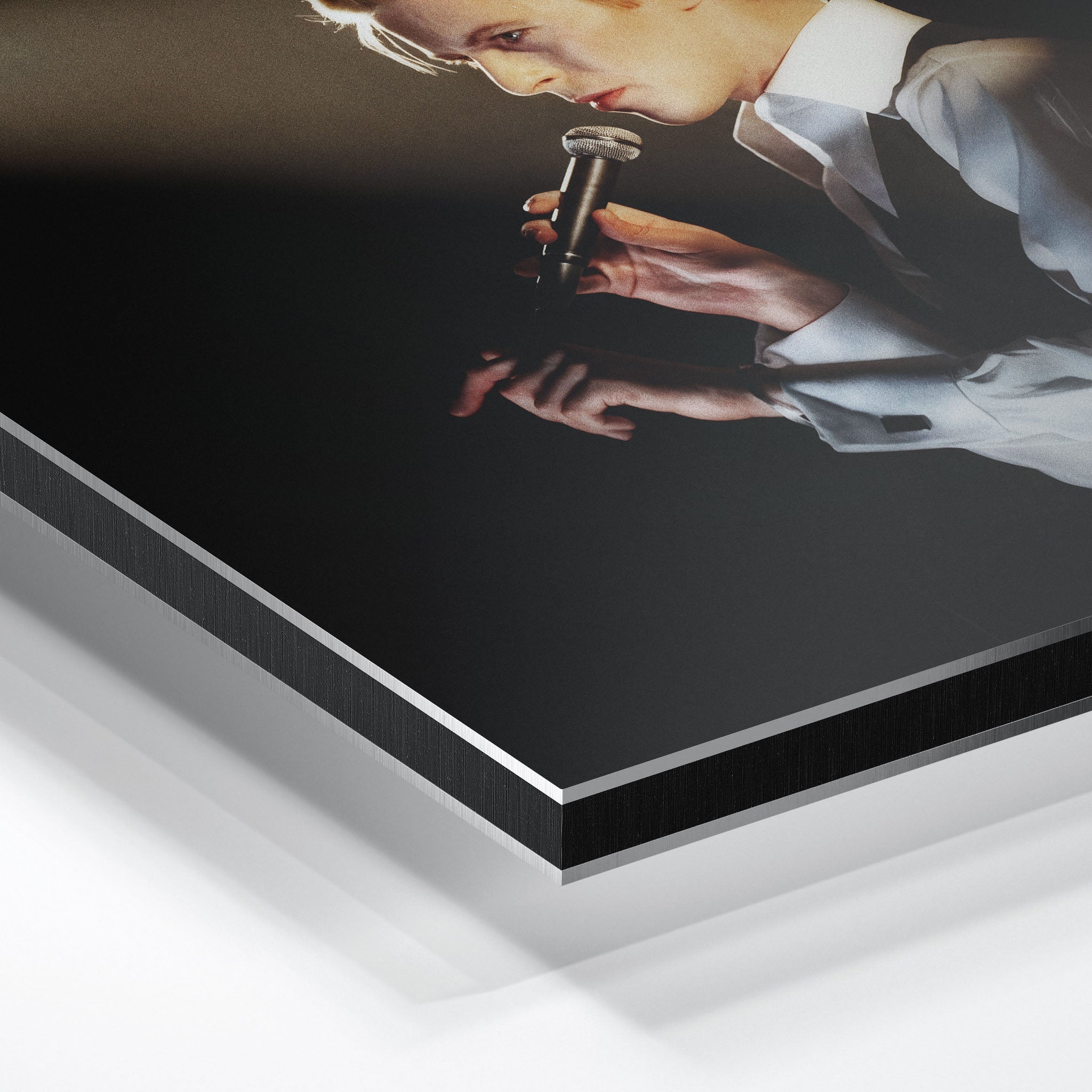 Macro close-up of the ultra-thin aluminum DIBOND panel edge of the David Bowie 1976 colorized metal print.