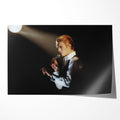 Unframed colour-enhanced David Bowie Golden Duke 1976 Isolar Tour profile poster print, golden hair under a warm spotlight.