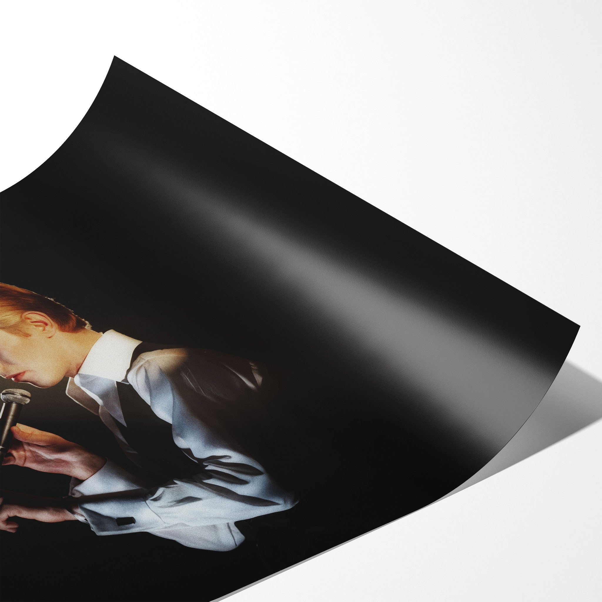 Angled close-up of the unframed premium matte David Bowie 1976 colorized poster print.