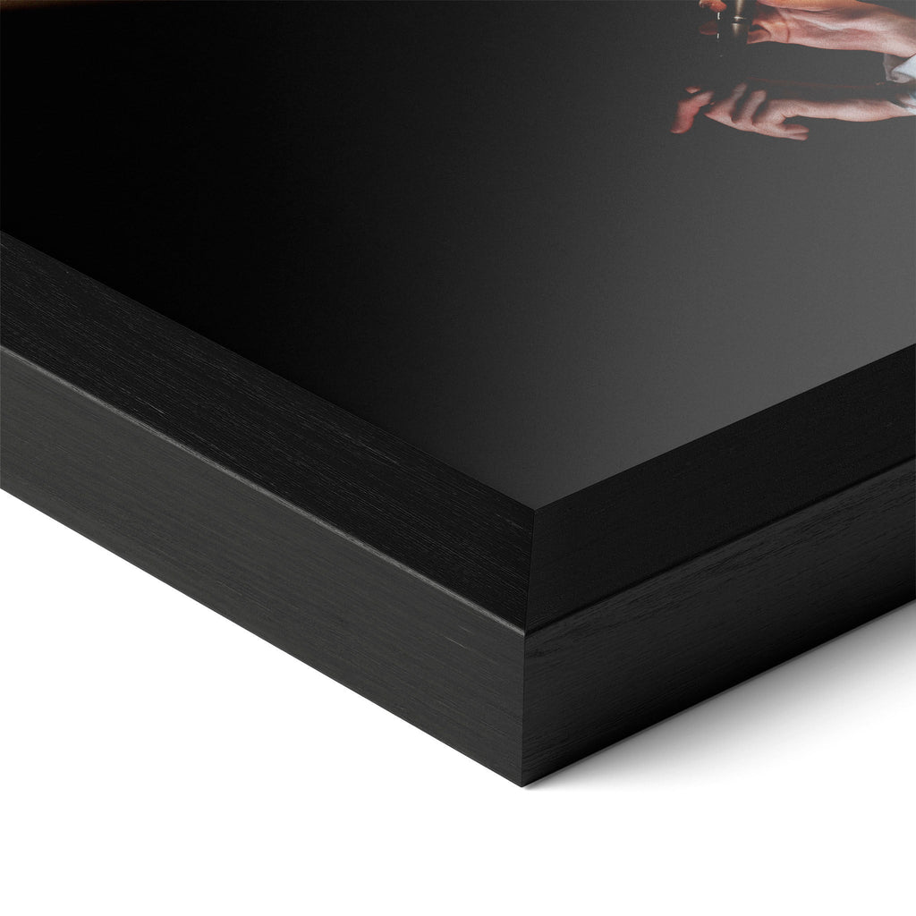 Detailed corner close-up of the premium black wooden frame holding the David Bowie 1976 colorized profile poster.