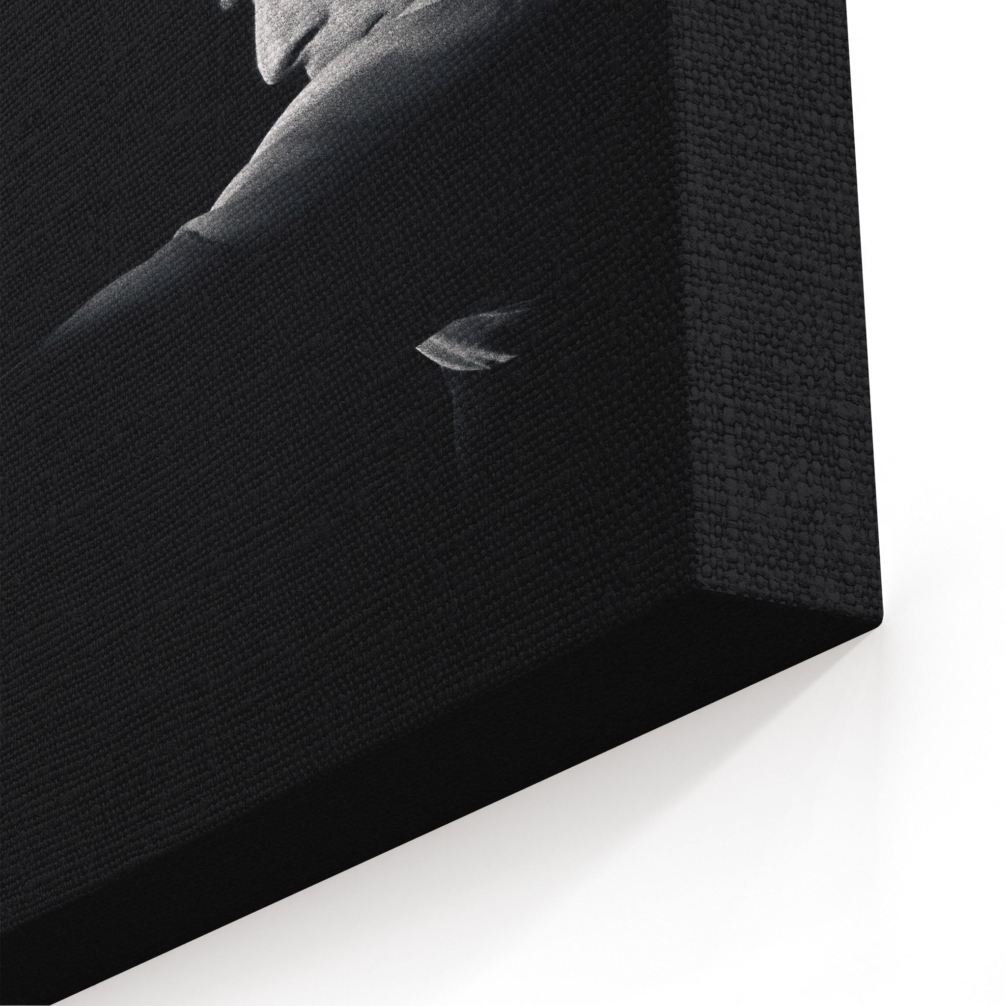 Close-up of the archival canvas texture and sharp black and white print detail on the gallery-wrapped edge.