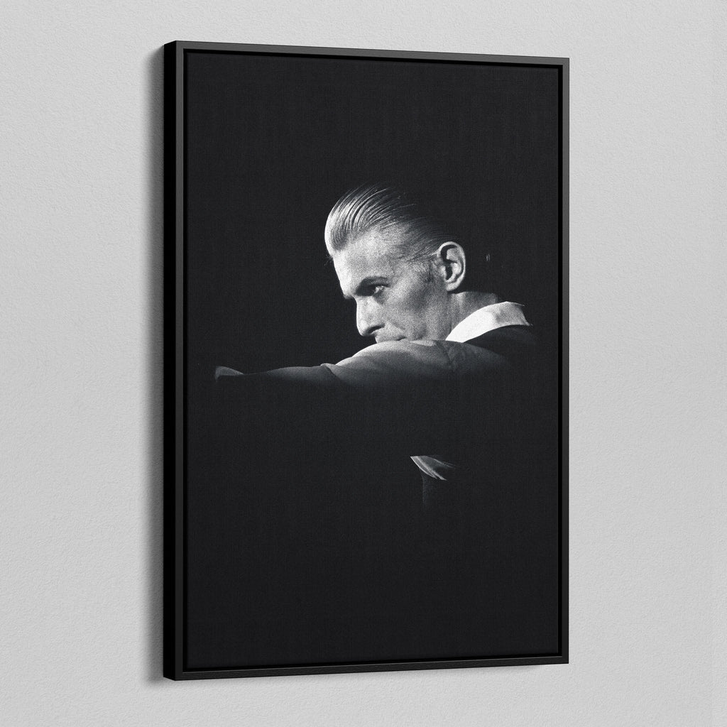 Side angle of the David Bowie 1976 black and white canvas in a luxury minimalist black floating frame.