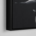 Corner macro of the elegant floating gap and fine finish of the black floating canvas frame.
