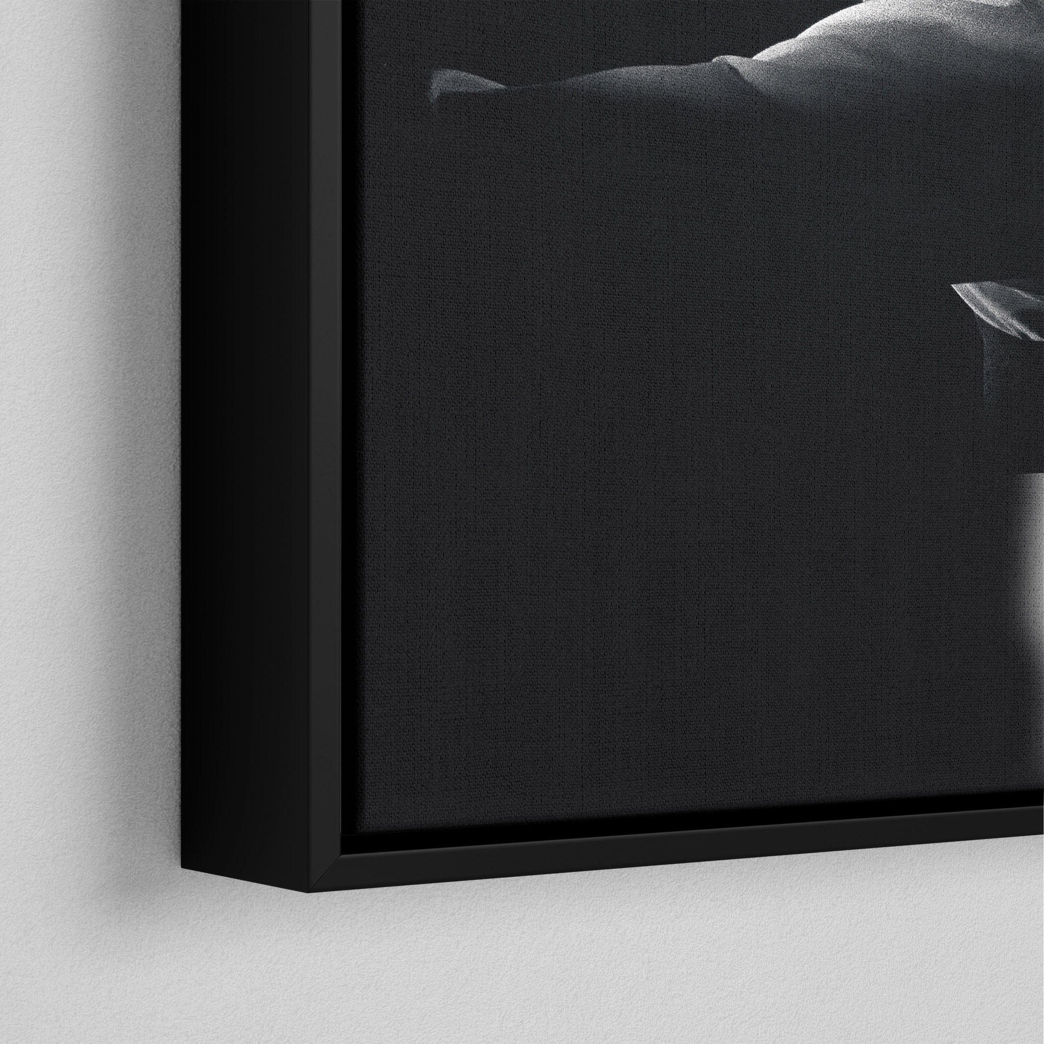 Corner macro of the elegant floating gap and fine finish of the black floating canvas frame.