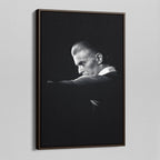 Angled view of the David Bowie 1976 black and white canvas in a sophisticated dark walnut floating frame.