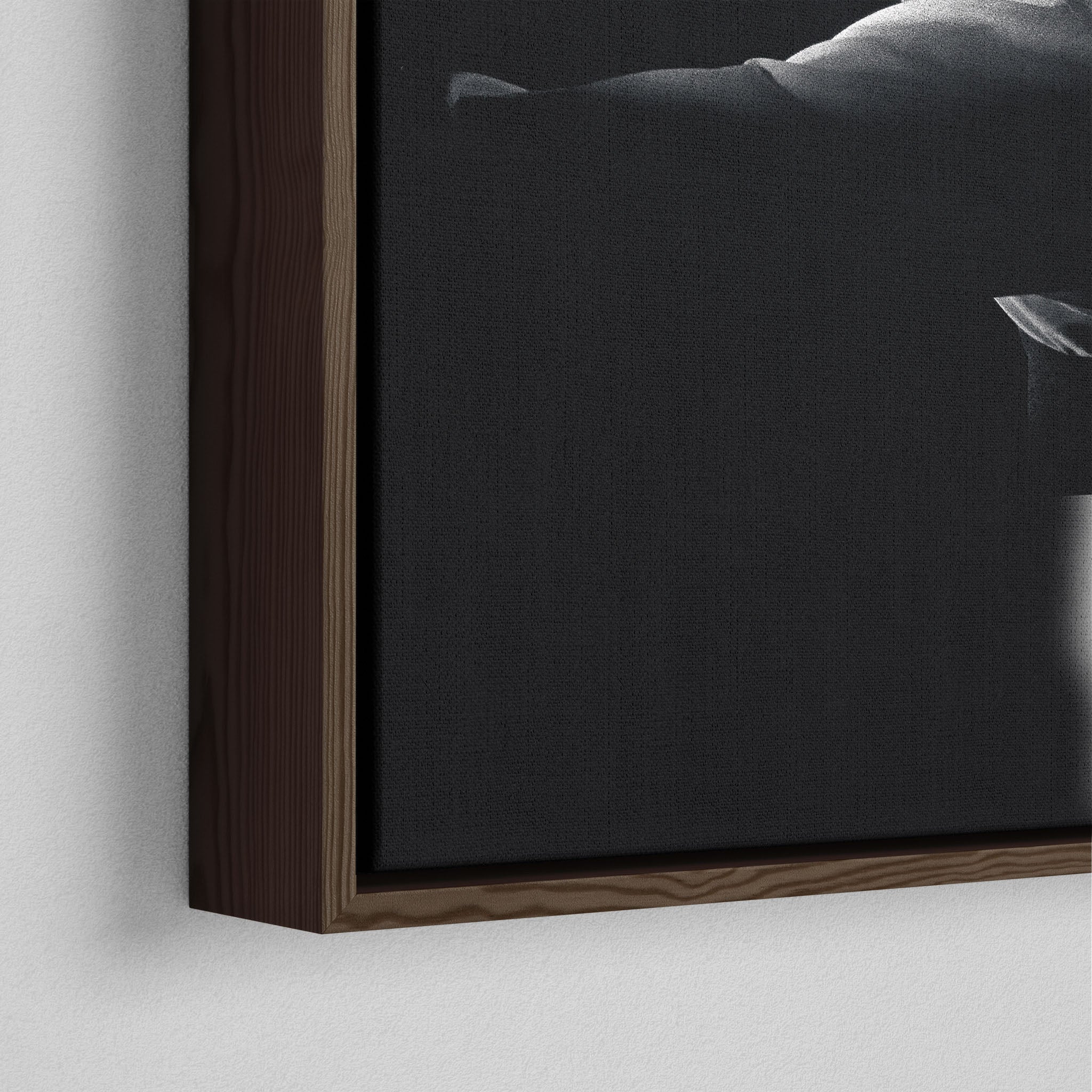 Corner close-up showing the rich grain and joinery of the dark walnut floating canvas frame.