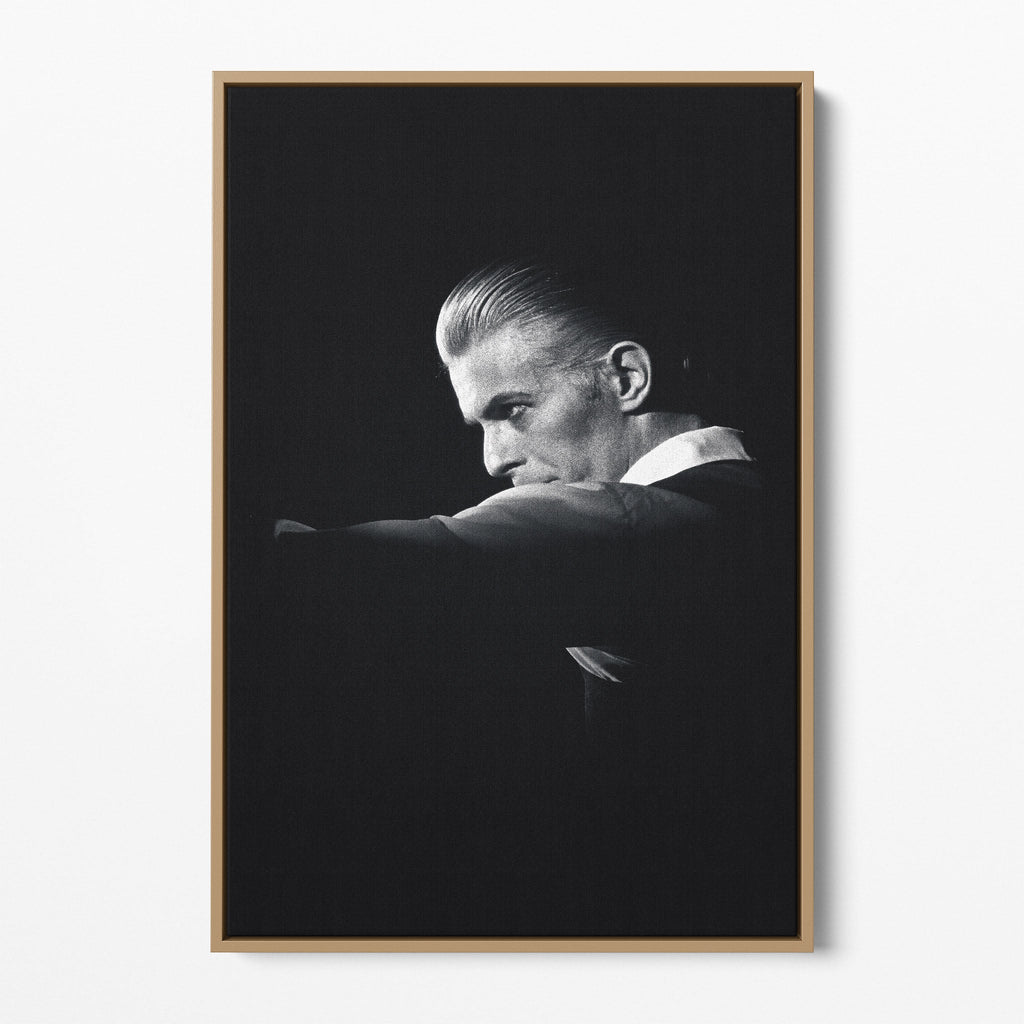 Front display of the David Bowie 1976 black and white canvas in a premium natural wood floating frame.