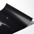 Angled close-up of the unframed premium matte black and white David Bowie 1976 poster print.