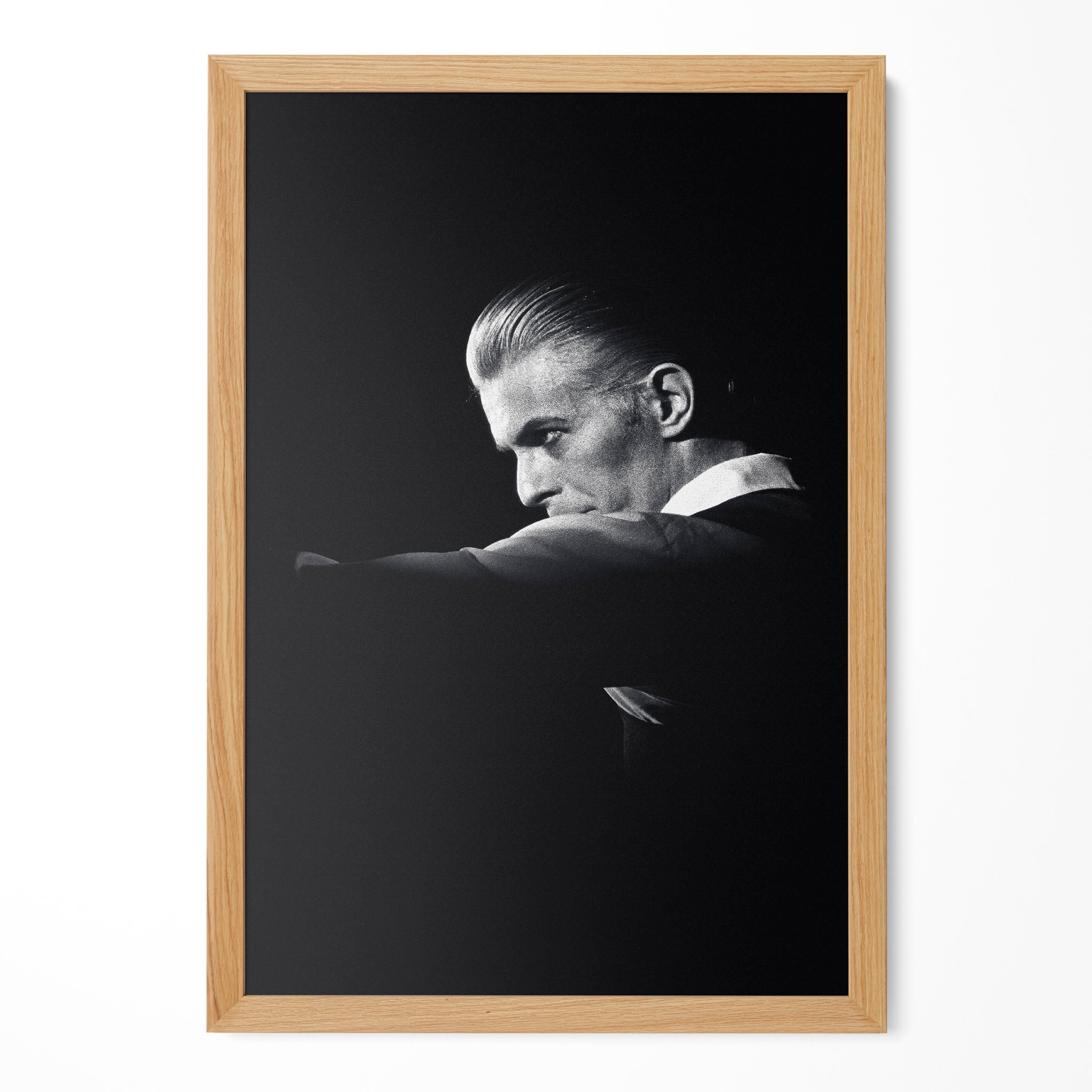 David Bowie 1976 Rotterdam black and white poster in a premium natural oak wood frame by POSTEREVER.