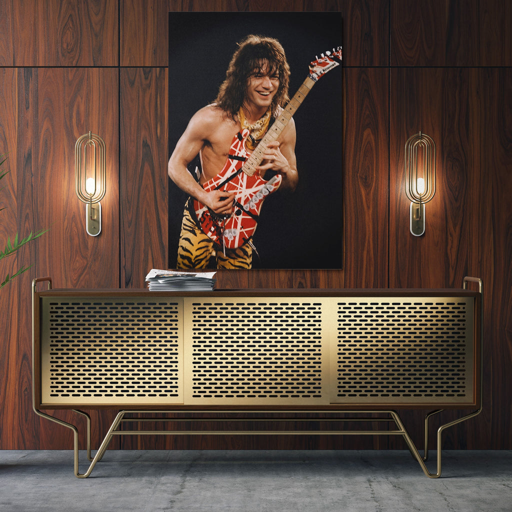 Sleek aluminum color metal print of Eddie Van Halen displayed over a mid-century modern credenza.