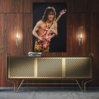 Sleek aluminum color metal print of Eddie Van Halen displayed over a mid-century modern credenza.