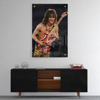 High-gloss acrylic glass color print of Eddie Van Halen displayed above a contemporary console.