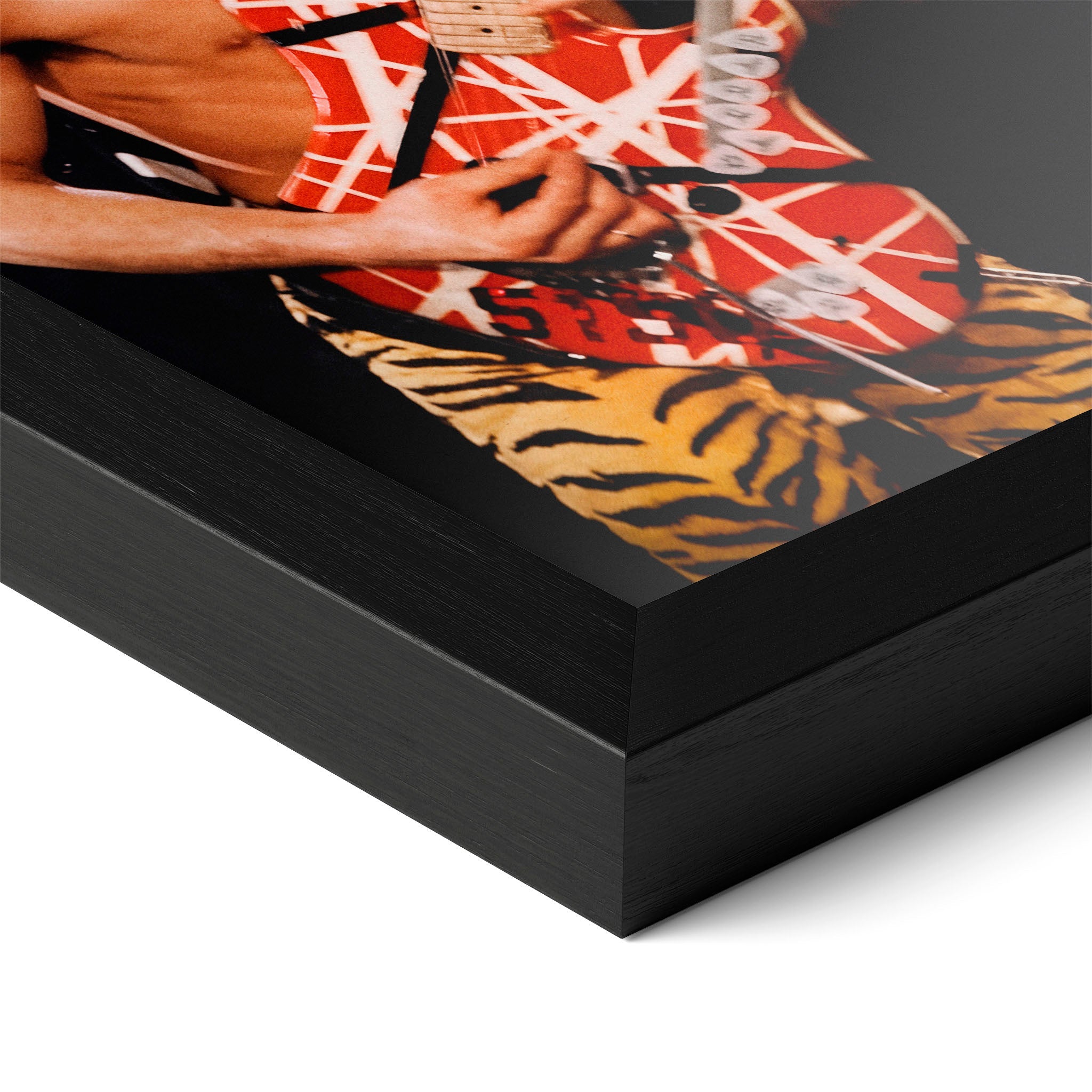 Detailed corner close-up of the premium black wooden frame holding the Eddie Van Halen 1984 rock poster.