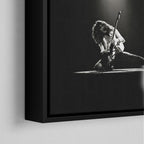 Corner macro of the elegant floating gap and fine finish of the black floating canvas frame.