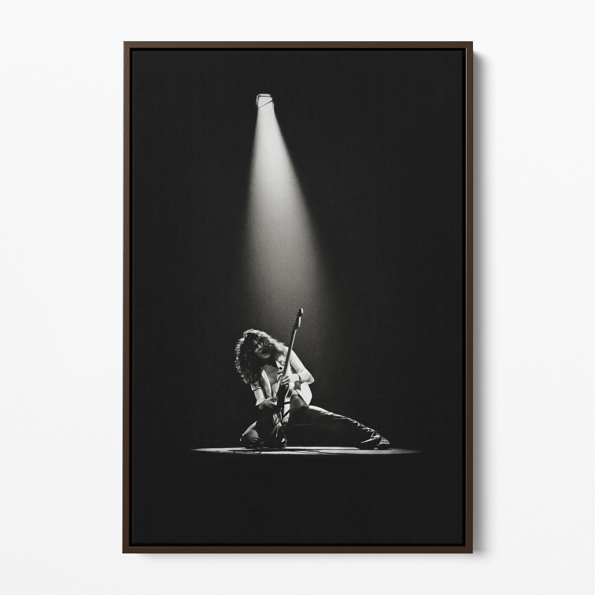 Front display of the Eddie Van Halen 1978 black and white canvas in a premium dark walnut floating frame.
