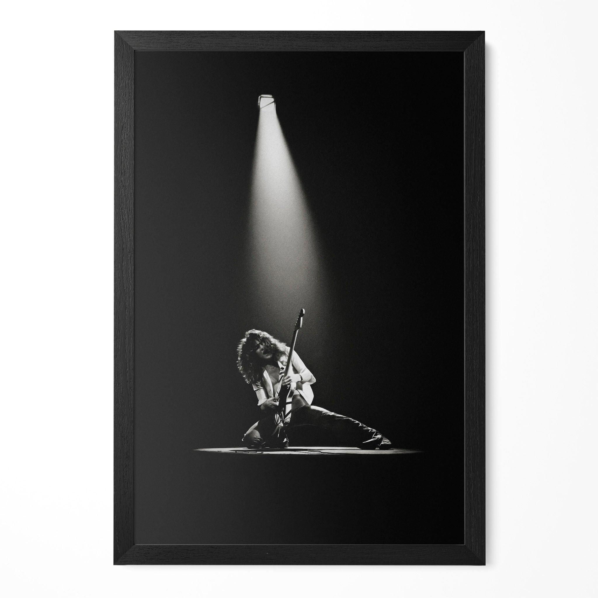 Eddie Van Halen 1978 Rainbow Theatre London black and white poster in a premium classic black wooden frame by POSTEREVER.