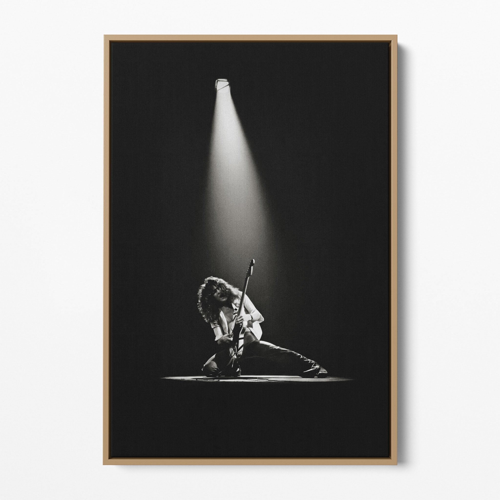 Front display of the Eddie Van Halen 1978 black and white canvas in a premium natural wood floating frame.