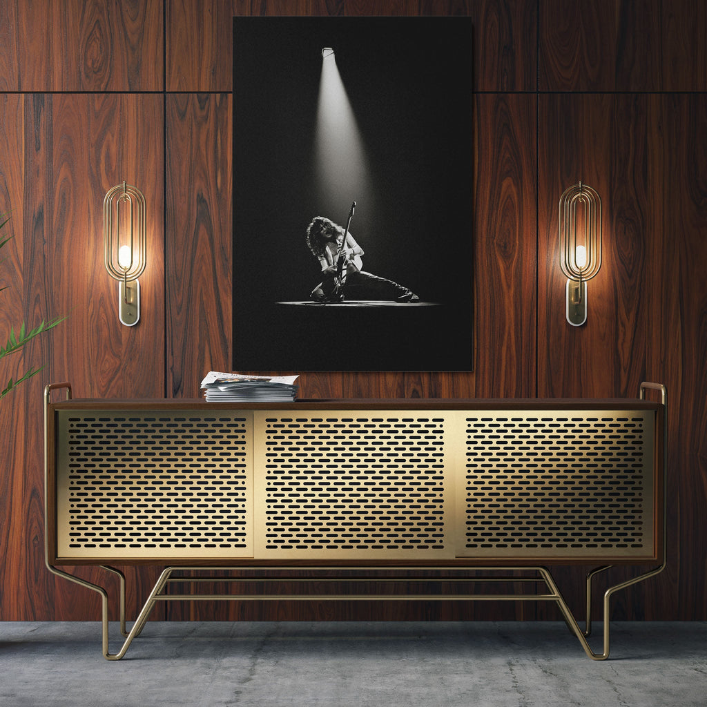 Sleek aluminum black and white metal print of Eddie Van Halen displayed over a mid-century modern credenza.