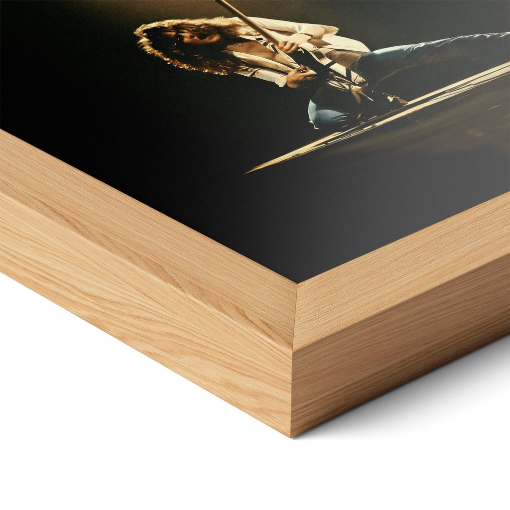 Corner close-up highlighting the natural oak finish of the framed Eddie Van Halen 1978 colorized poster.