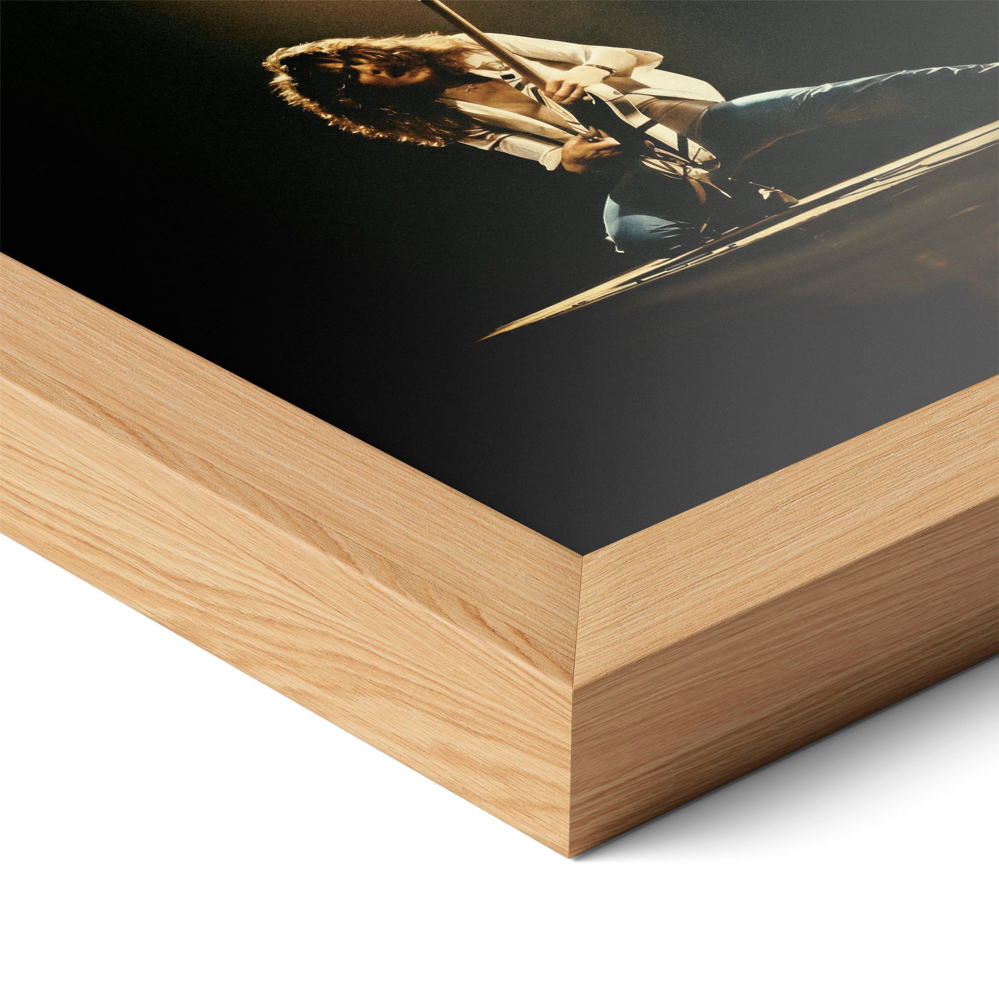 Corner close-up highlighting the natural oak finish of the framed Eddie Van Halen 1978 colorized poster.