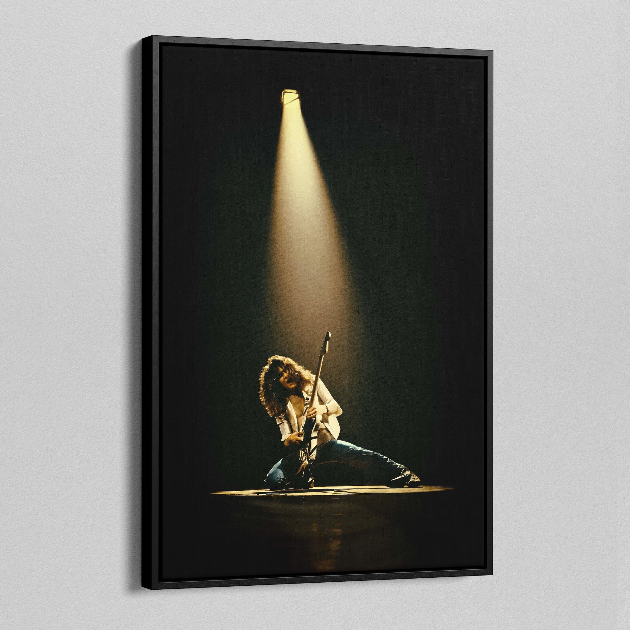 Side angle of the Eddie Van Halen 1978 colorized canvas in a luxury minimalist black floating frame.