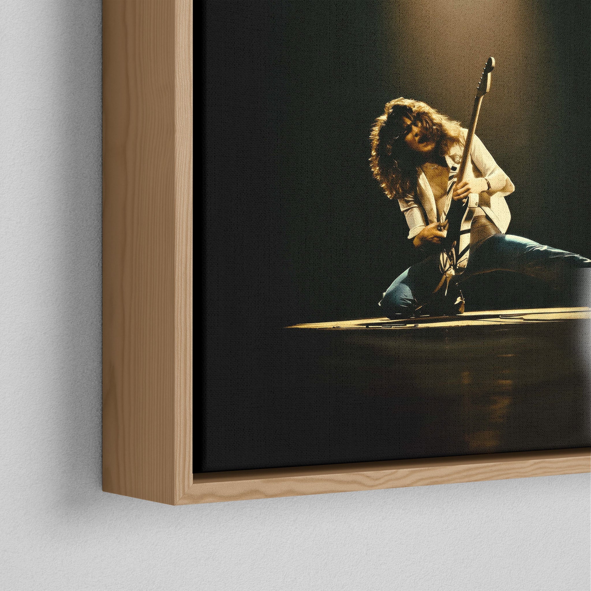 Corner close-up of the floating gap and grain texture of the natural wood canvas frame.