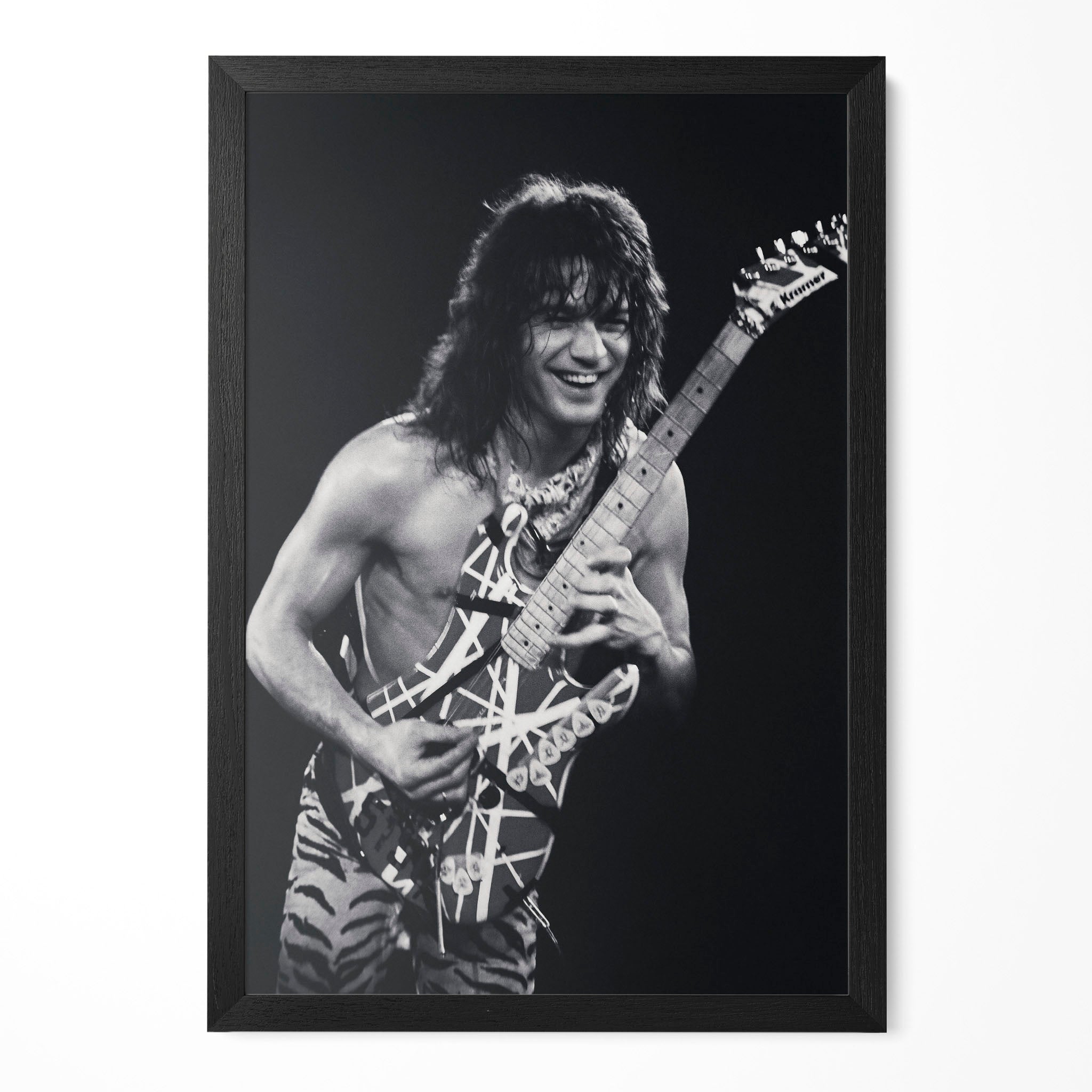 Eddie Van Halen 1984 Cow Palace black and white poster in a premium classic black wooden frame by POSTEREVER.