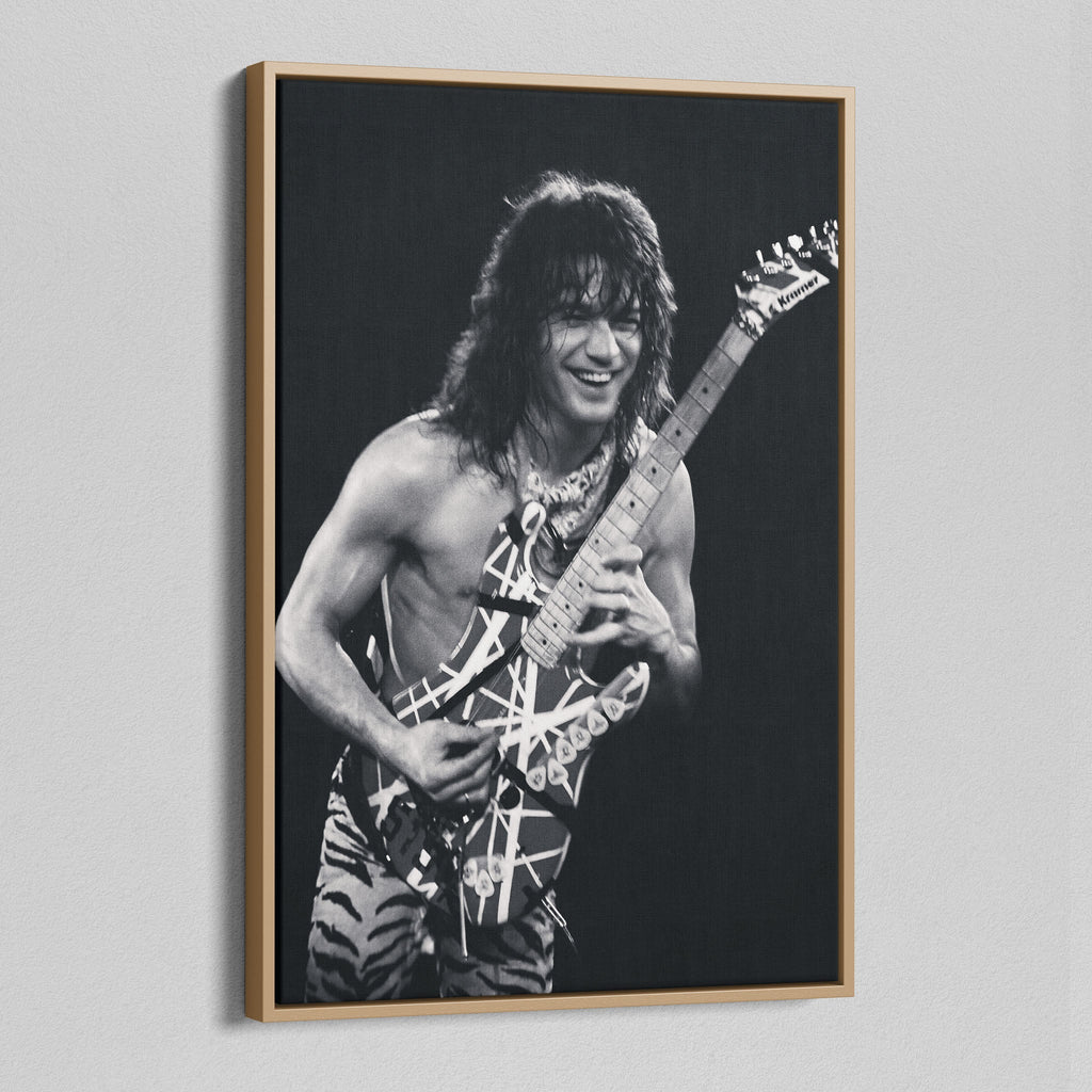 Angled view of the black and white canvas in a modern natural oak wood floating frame.