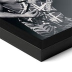 Detailed corner close-up of the premium black wooden frame holding the Eddie Van Halen 1984 black and white rock poster.