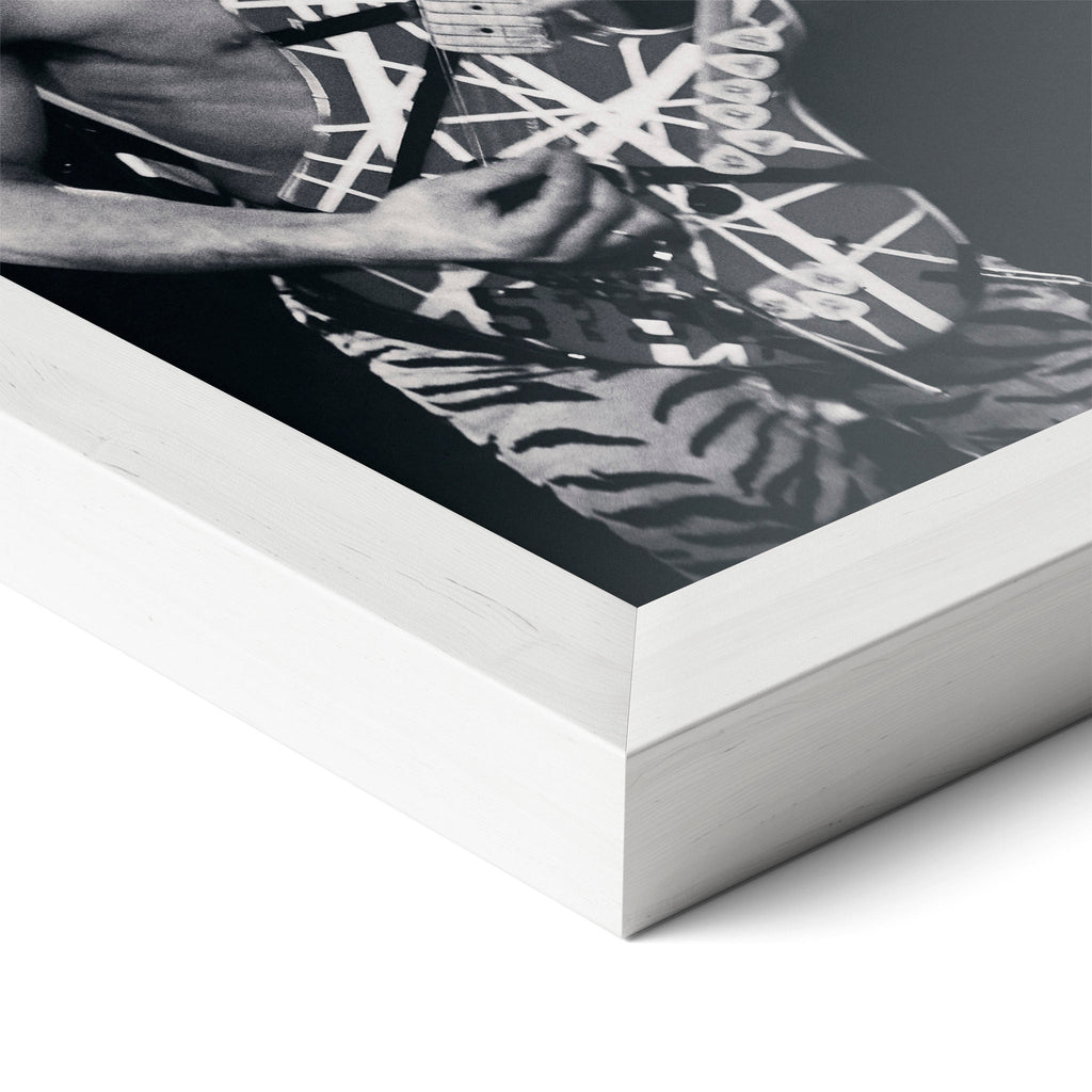 Corner close-up revealing the clean wood grain of the white framed Eddie Van Halen 1984 black and white art print.