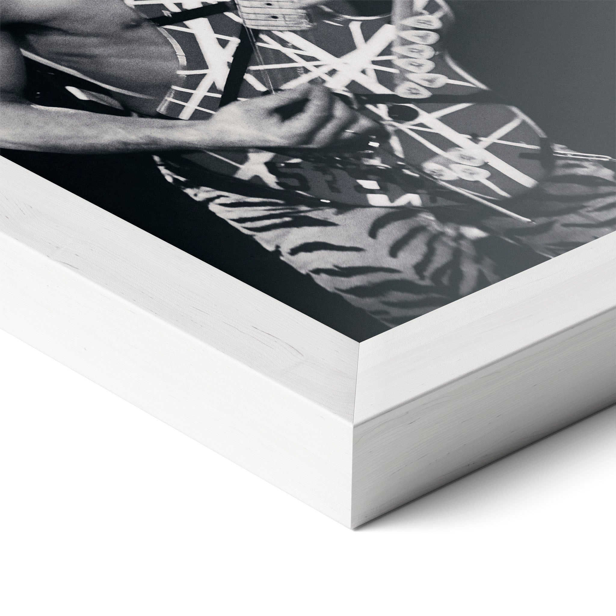 Corner close-up revealing the clean wood grain of the white framed Eddie Van Halen 1984 black and white art print.