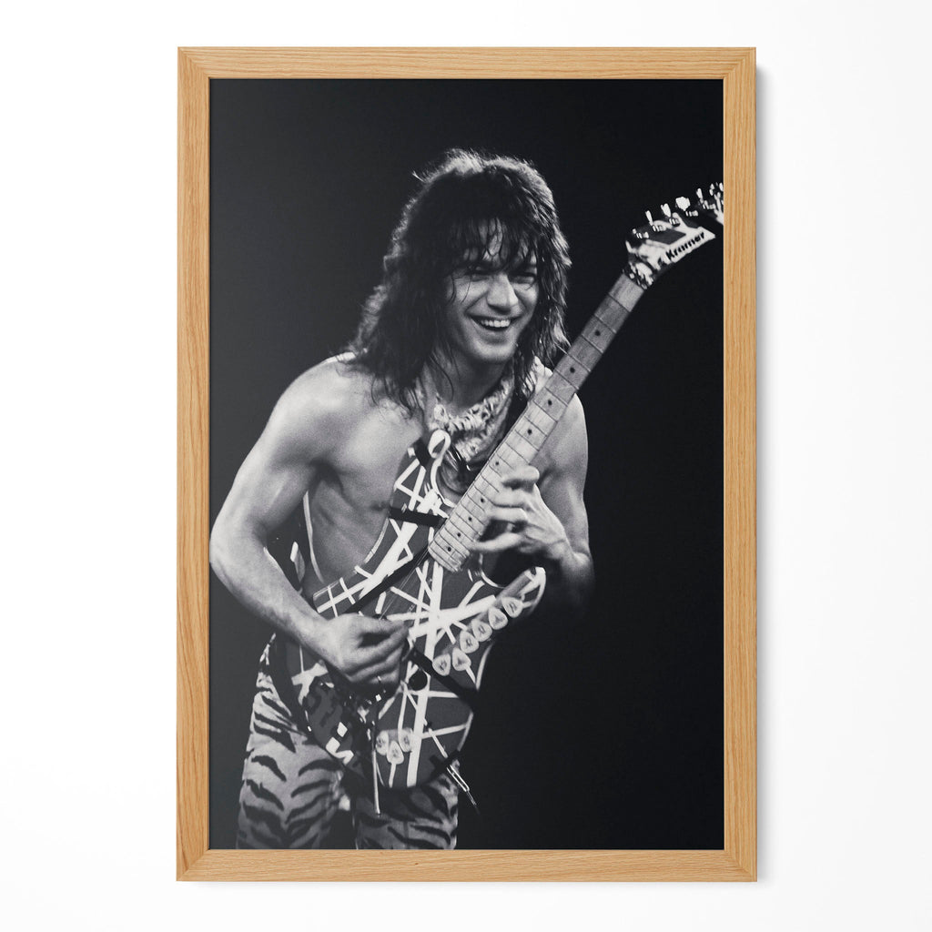 Eddie Van Halen 1984 live black and white guitar poster in a premium natural oak wood frame by POSTEREVER.