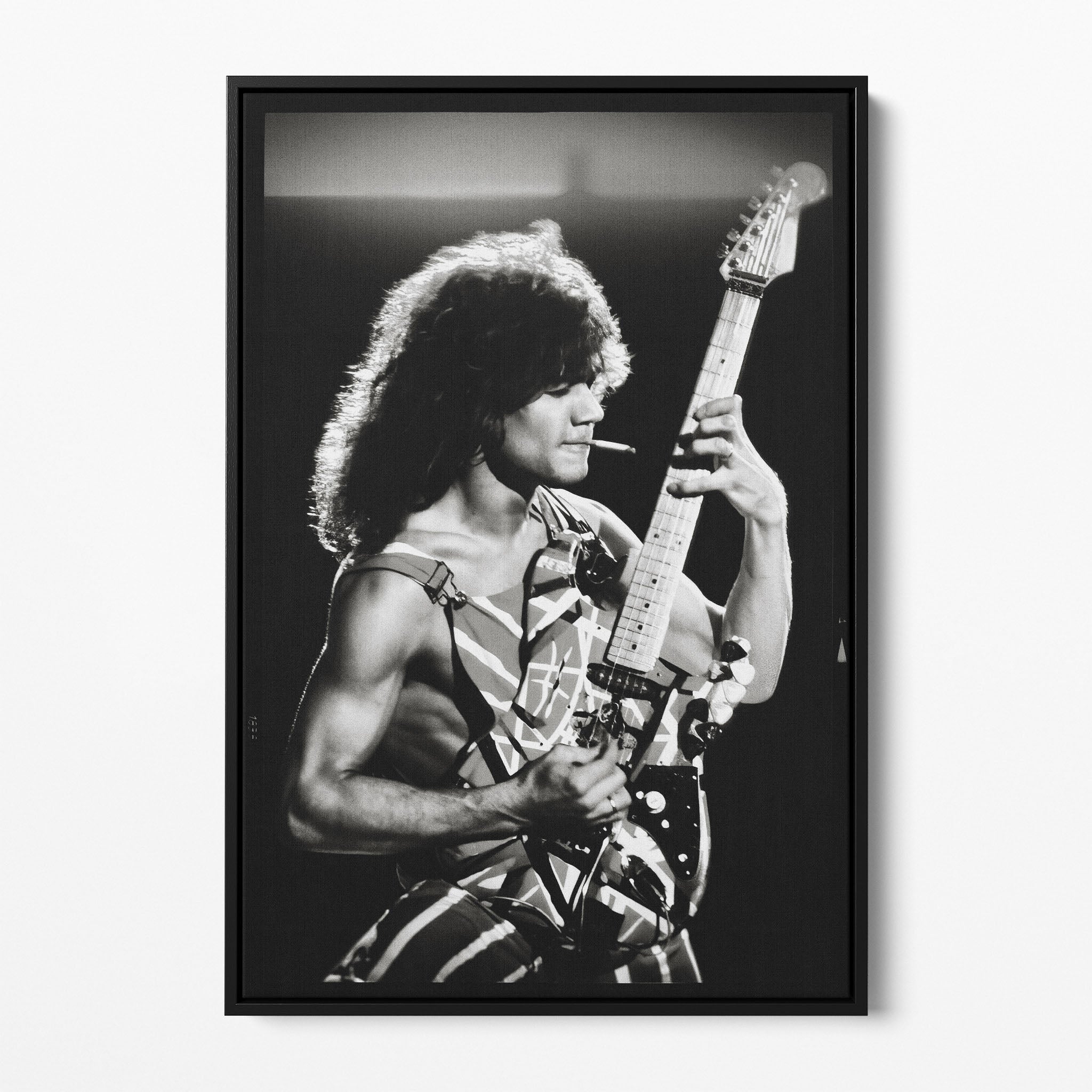 Front view of the Eddie Van Halen 1982 black and white canvas in a sleek black floating frame.
