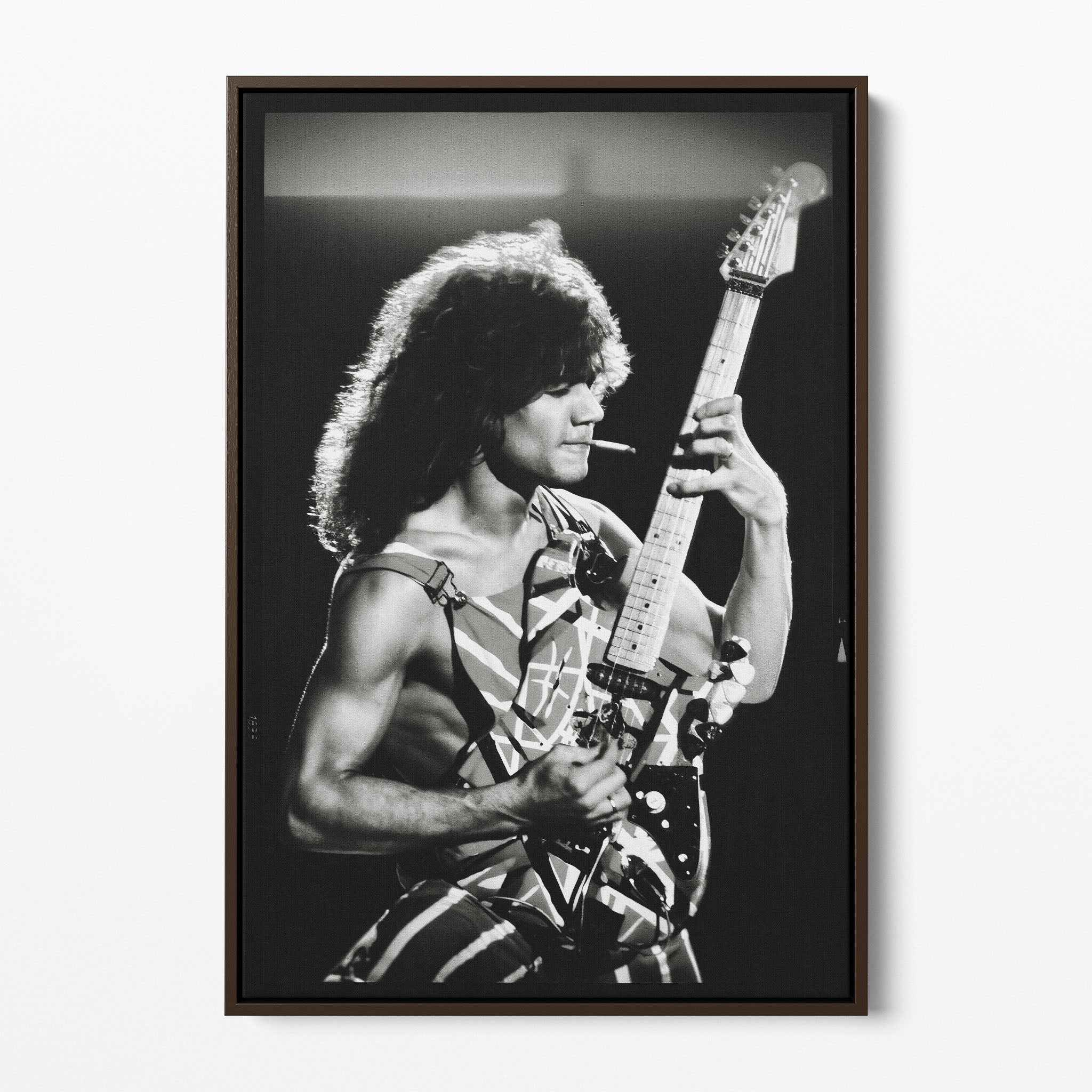 Front display of the Eddie Van Halen black and white canvas in a premium dark walnut floating frame.