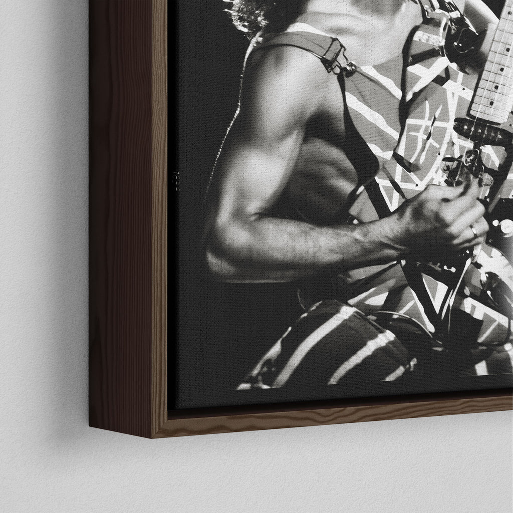 Corner close-up showing the rich grain and joinery of the dark walnut floating canvas frame.
